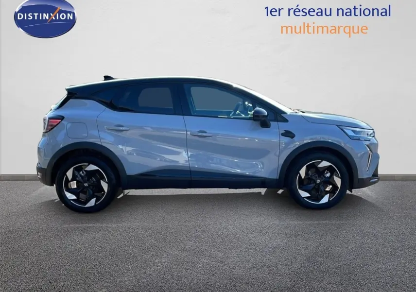 Renault Captur E-Tech hybride 2025 gris Rafale métal vue profil côté gauche avec toit noir et jantes bi-ton.