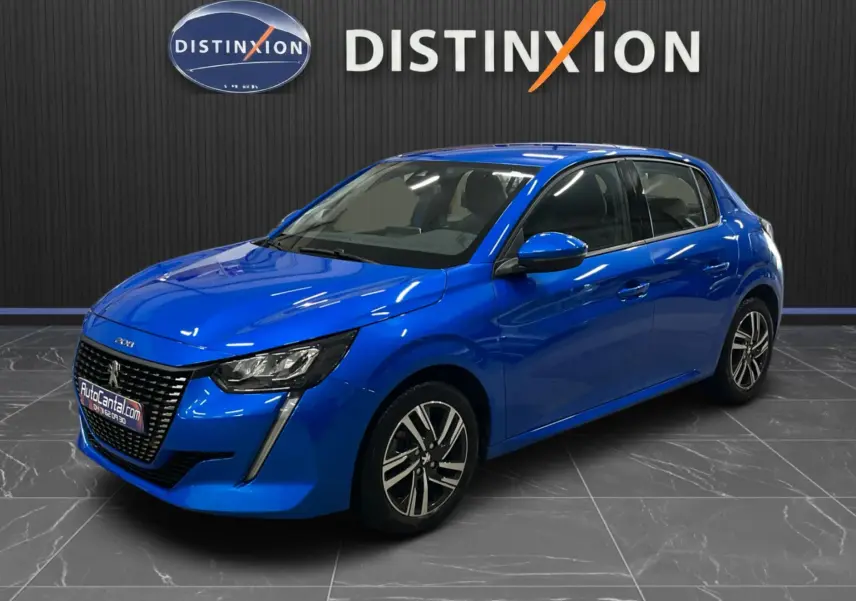 Peugeot 208 Bleu Vertigo vue 3/4 avant droit, avec calandre distinctive et jantes alliage bicolores.