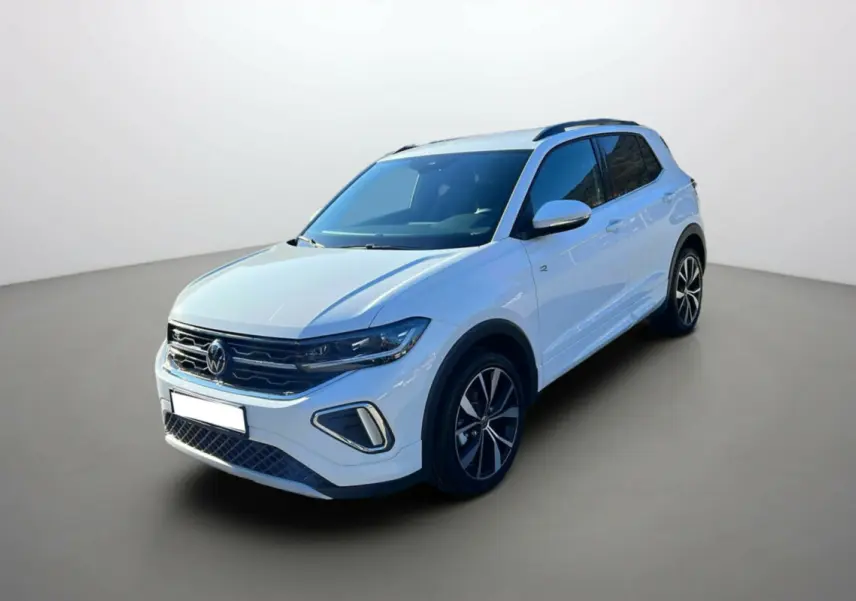 Volkswagen T-Cross TSI 116 DSG7 R-Line blanc pur en 3/4 avant droit avec jantes alu 18 pouces et barres de toit.