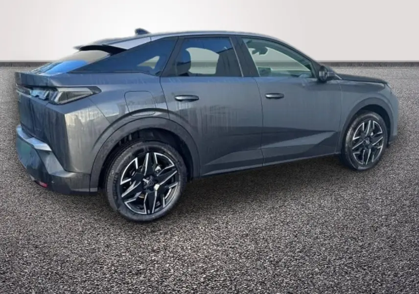 Peugeot 3008 gris foncé vue de profil côté droit, avec jantes alliage 19 pouces et toit panoramique.
