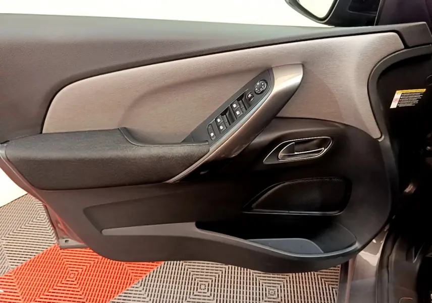 Porte avant gauche de Citroën Grand C4 Spacetourer gris foncé avec commandes électriques et poignée chromée.