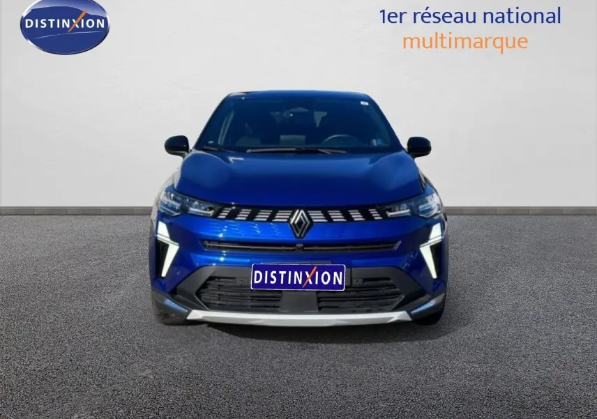 Vue frontale d'une Renault Symbioz 2025 bleu iron metal avec signature lumineuse LED distinctive.