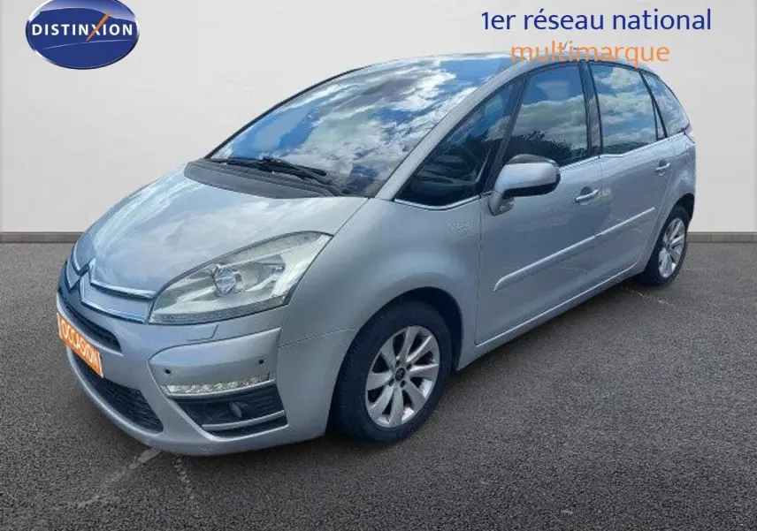 Citroën C4 Picasso gris alu métal vue 3/4 avant droit avec feux LED et jantes alliage.