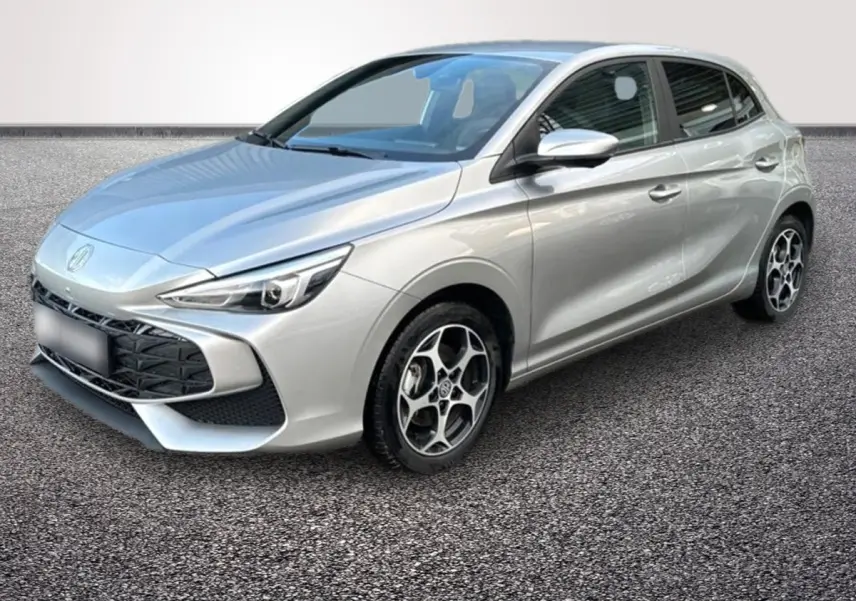 MG3 gris clair en vue 3/4 avant droit, avec calandre noire et jantes alliage au design moderne.