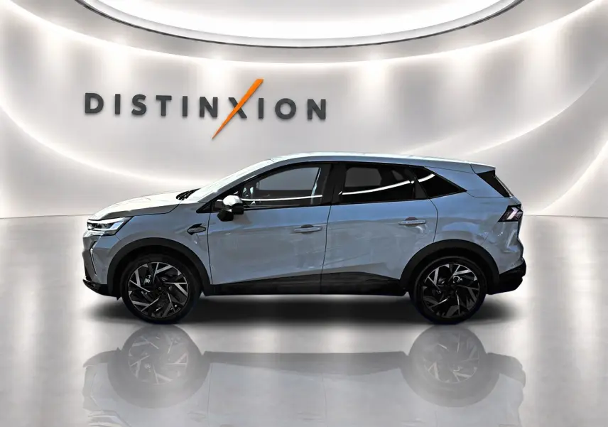 Profil droit du Renault Symbioz gris rafale 2026, SUV hybride avec jantes noires et toit noir contrasté.