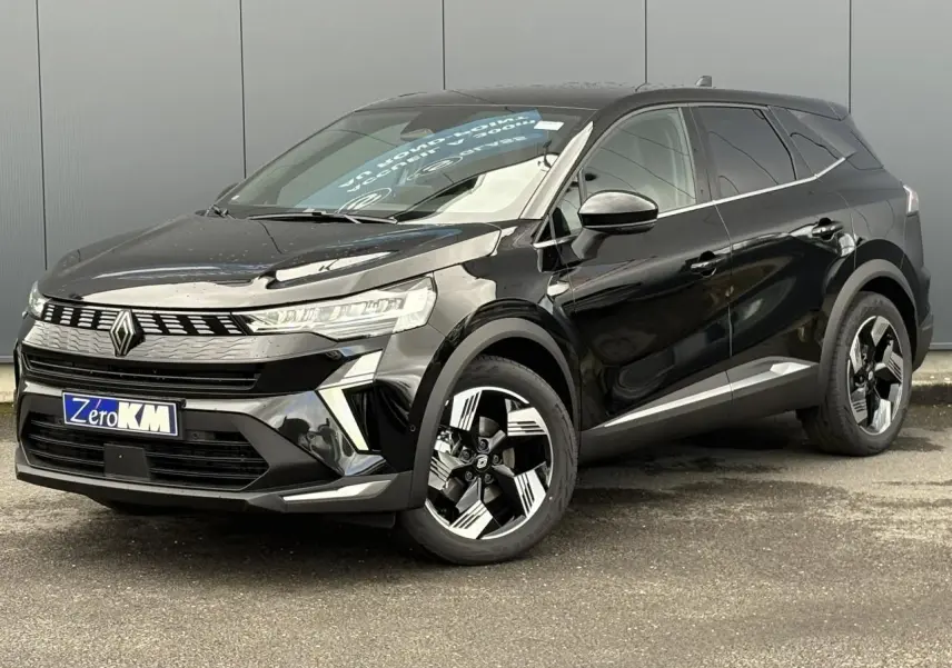 Renault Symbioz E-Tech Full Hybrid noir étoile en 3/4 avant droit avec jantes 18 pouces et calandre distinctive.