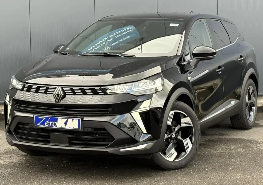 Renault SYMBIOZ noir étoile en 3/4 avant droit, avec calandre distinctive et jantes 18 pouces Gravity.