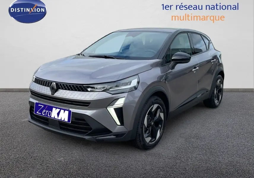 Renault Captur E-Tech hybride gris cassiopée 3/4 avant droit avec toit noir et jantes biton.