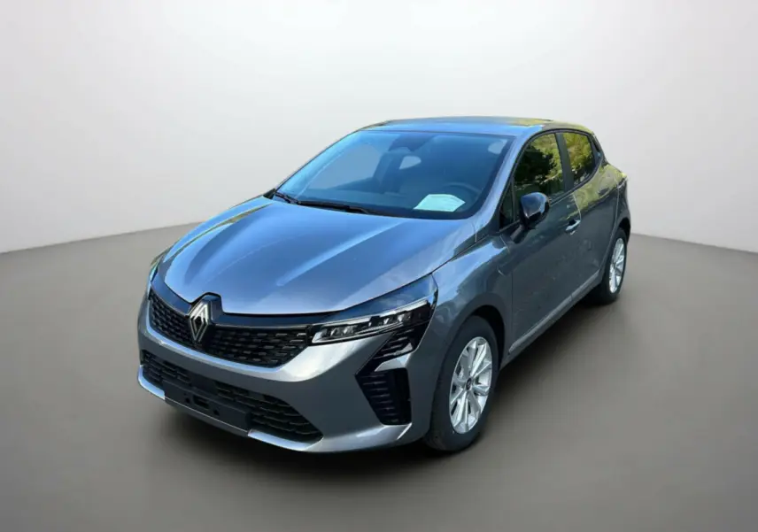 Renault Clio 2025 gris schiste vue 3/4 avant droit, calandre noire et phares LED distinctifs, finition Evolution PK Look.