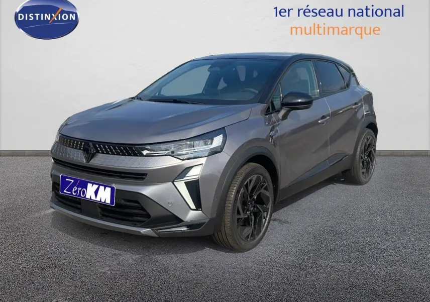 Renault Captur E-Tech hybride gris cassiopée avec toit noir, vue 3/4 avant droit mettant en valeur ses jantes noires.