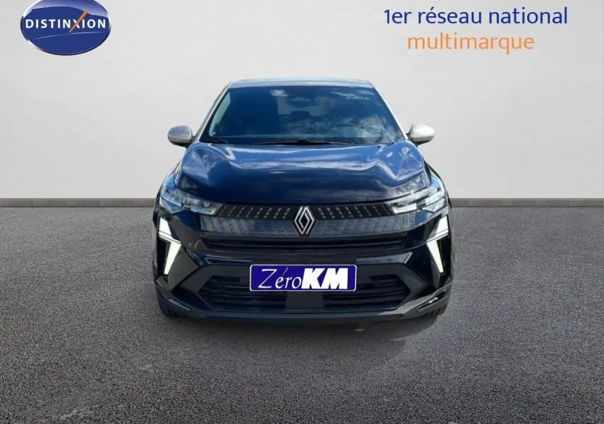 Vue avant d'un Renault Captur E-Tech hybride noir étoile avec toit gris, éclairage LED et calandre moderne.