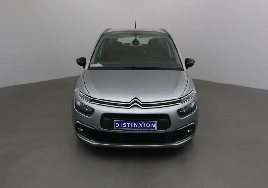 Citroën Grand C4 Spacetourer gris Artense vu de face, avec calandre distinctive et phares étirés.