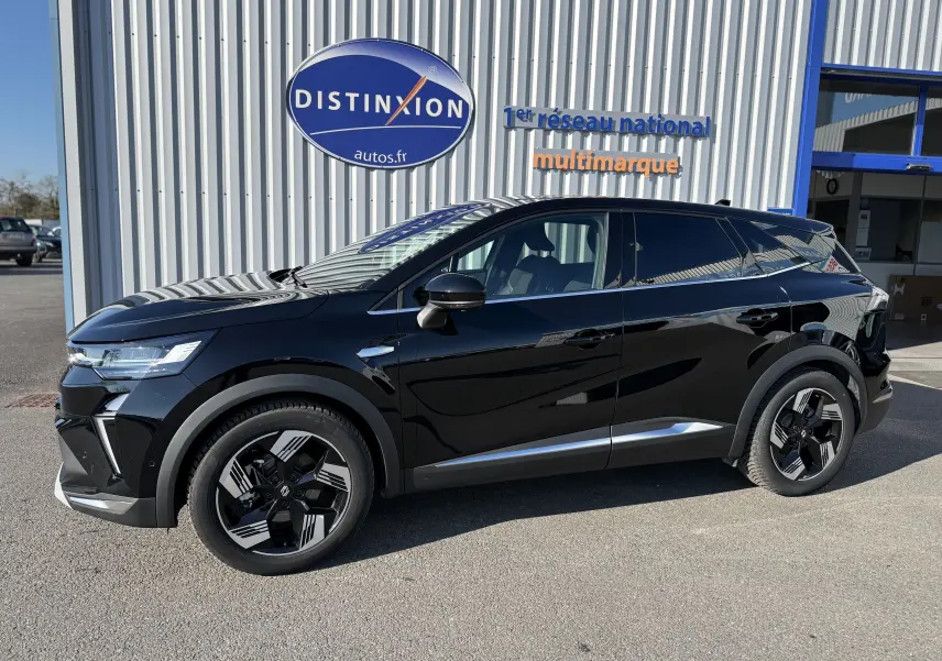 Renault Symbioz noir étoile métal en vue profil droit, soulignant ses jantes modernes et son design élégant SUV hybride.