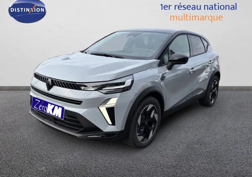Renault Captur II hybride gris Rafale métal avec toit noir, vue 3/4 avant mettant en valeur les phares LED distinctifs.
