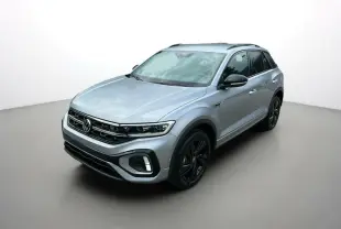 Volkswagen T-Roc TDI 150 R-Line Black gris pyrite en 3/4 avant droit avec jantes noires et barres de toit noires.