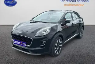 Ford Puma noir vue 3/4 avant droit avec phares LED et jantes alliage distinctives.