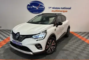 Renault Captur II Iconic blanc nacré en 3/4 avant droit avec toit ouvrant et jantes bi-ton visibles.