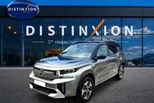 Citroën C3 Aircross gris mercury vue 3/4 avant droit avec jantes alu et toit noir devant showroom Distinxion.