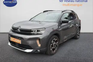 SUV Citroën C5 Aircross gris platinium en 3/4 avant droit, avec jantes bi-ton et détails couleur bronze sur la carrosserie.