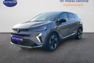 Renault Symbioz 2025 gris cassiopée métal en 3/4 avant droit, SUV hybride avec lignes modernes et jantes bicolores.