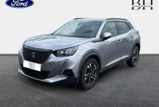Peugeot 2008 gris Artense vue 3/4 avant droit avec calandre noire et jantes alliage noires et argentées