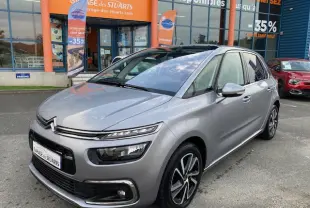 Citroën C4 Spacetourer gris Artense vue 3/4 avant avec jantes alliage bi-ton et signature lumineuse LED.