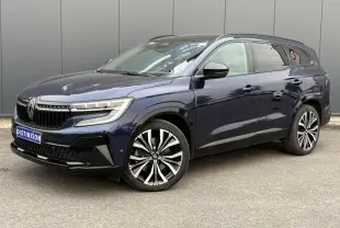 Renault Espace VI 6 E-Tech Full Hybrid bleu nuit en 3/4 avant droit avec jantes alliage et toit panoramique.