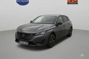 Peugeot 308 gris en 3/4 avant droit, avec calandre noire distinctive et phares LED fins dans un studio.