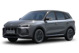 Vue 3/4 avant du SUV MG ZS 1.5L Hybrid+ 2025 en gris Hampstead, avec calandre noire et jantes foncées.