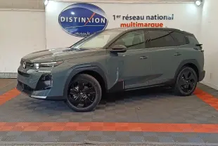 Vue de profil droit du Citroën C5 hybride 145ch vert, avec jantes noires et détails noirs contrastants.
