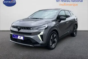 Renault Symbioz gris cassiopée métal en 3/4 avant droit, SUV hybride au design moderne et feux LED distinctifs.