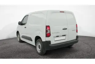Vue 3/4 arrière droite du Citroën Berlingo blanc utilitaire avec portes arrière battantes et protections noires.