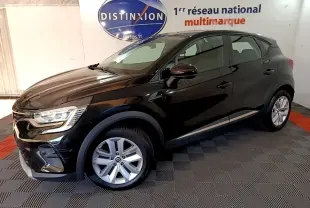 Renault Captur Business noir vue 3/4 avant droit, feux LED et jantes alliage visibles en intérieur showroom.
