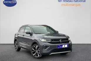 Volkswagen T-Cross 1.0 TSI R-Line gris, vue 3/4 avant avec jantes alliage et calandre noire distinctive.