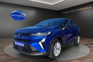 Renault Captur TCE 90 Evolution bleu Iron avec toit noir, vue 3/4 avant mettant en valeur sa calandre moderne et ses phares LED.