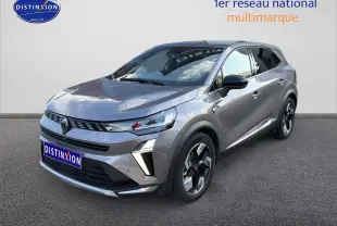 Renault Symbioz 2025 gris métallisé en 3/4 avant droit, avec calandre moderne et jantes noires distinctives.