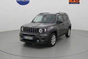 Jeep Renegade bleu foncé en 3/4 avant droit, avec barres de toit et jantes alliage 17 pouces visibles.