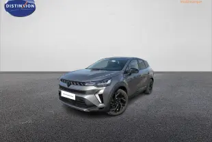 Renault Symbioz gris métallisé en 3/4 avant droit, avec jantes noires et signature lumineuse LED distinctive.