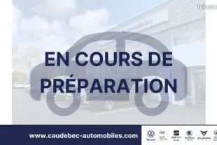 Image générique avec texte "En cours de préparation" masquant un Volkswagen ID.4 blanc en 3/4 avant, sans détails visibles.