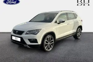 SEAT Ateca blanc Nevada métal vue 3/4 avant droit avec jantes alliage et toit panoramique en verre.