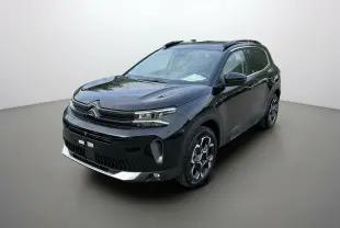 Citroën C5 Aircross Hybrid 2025 noir en 3/4 avant droit avec jantes distinctives et toit ouvrant visible