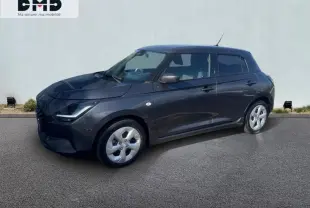 Suzuki Swift 1.2 Hybrid 83ch Privilège en Mineral Gray Metal, vue 3/4 avant côté gauche, jantes alu visibles.