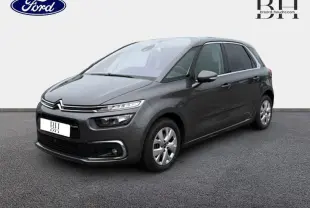 Citroën C4 Spacetourer gris Platinium vue 3/4 avant droit, avec feux LED et jantes alu visibles.