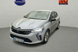 Renault Clio V Blue dCi gris vue 3/4 avant droit, avec phares LED et calandre noire distinctive.