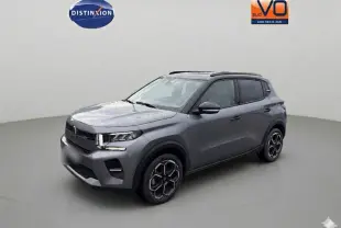 Citroën C3 Turbo 100 ch gris, vue 3/4 avant droit, avec barres de toit et jantes alliage 17 pouces.