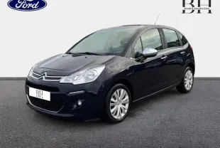 Citroën C3 bleu encre vue 3/4 avant droit, avec rétroviseurs chromés et jantes argentées.