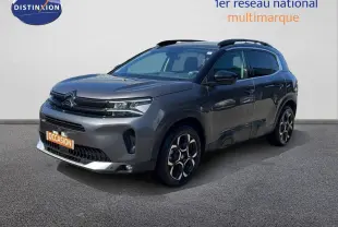 SUV Citroën C5 Aircross gris platinium métal, vue 3/4 avant droit avec jantes bi-ton et toit noir.