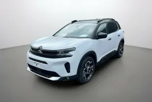 Citroën C5 Aircross blanc okénite en 3/4 avant droit, avec toit noir et jantes alu 18 pouces distinctives.