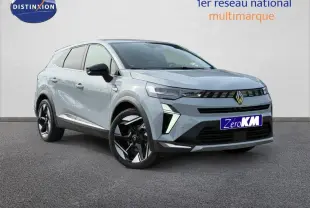 Renault Symbioz gris Rafale métallisé en 3/4 avant droit avec jantes noires et détails LED distinctifs.