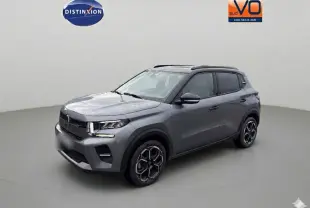 Citroën C3 Turbo 100 ch gris vue 3/4 avant droit avec jantes alliage et barres de toit visibles.